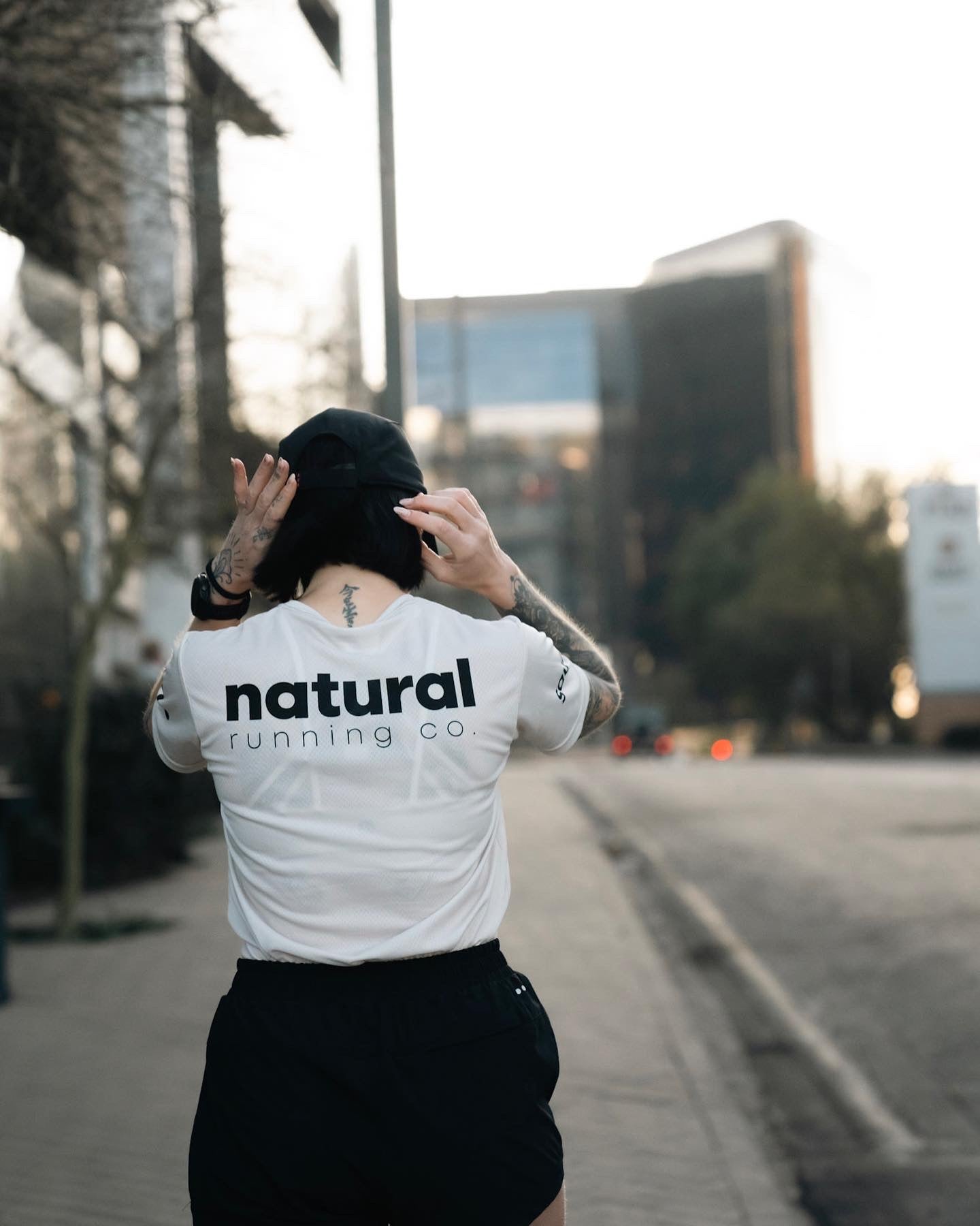 the OG beige ladies community tee.