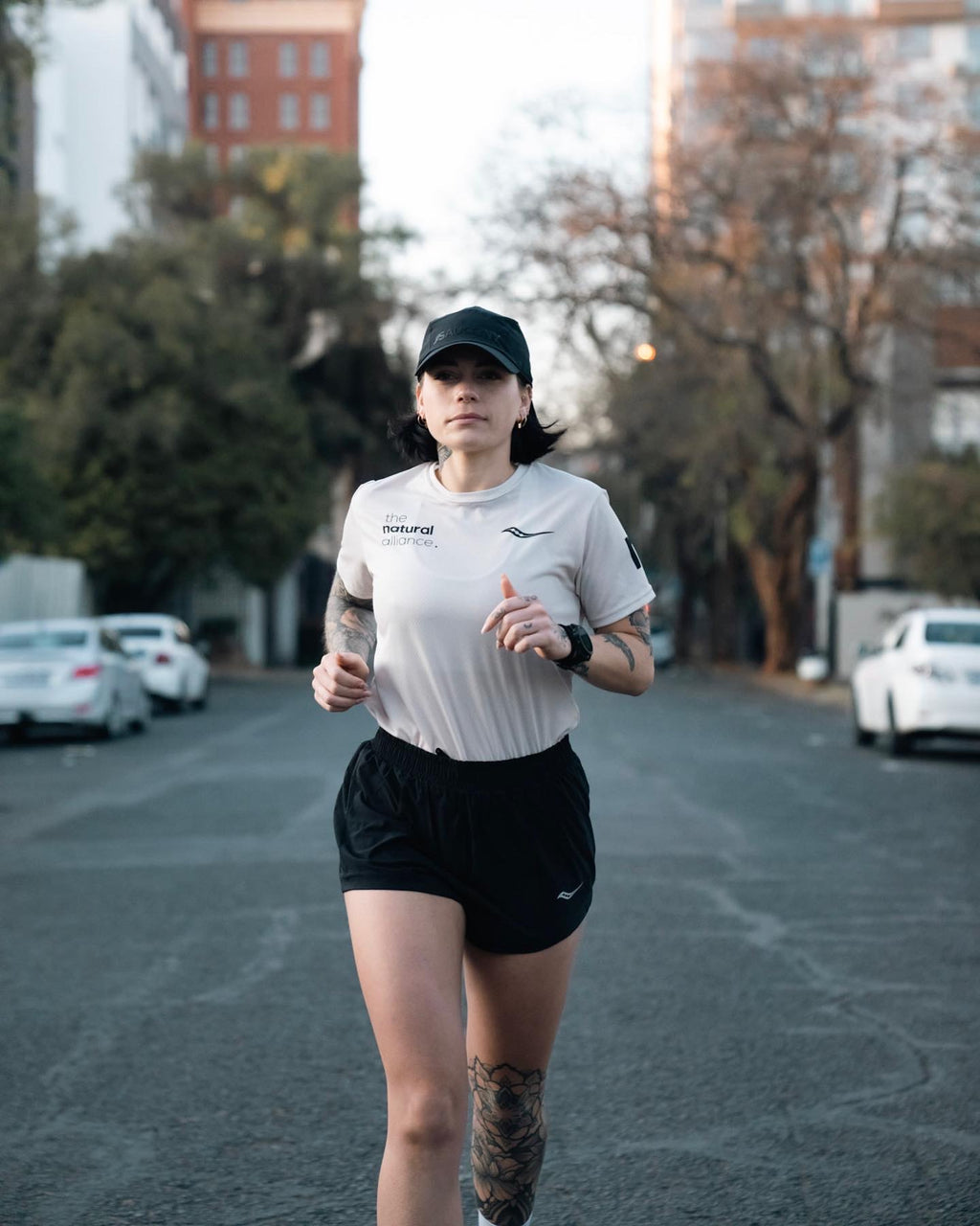 the OG beige ladies community tee.