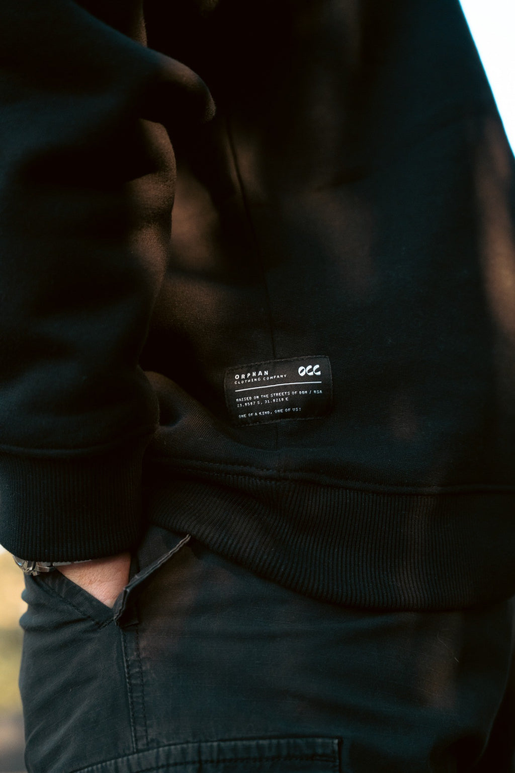 the unisex blackout crew-neck sweater.