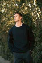 the unisex blackout crew-neck sweater.