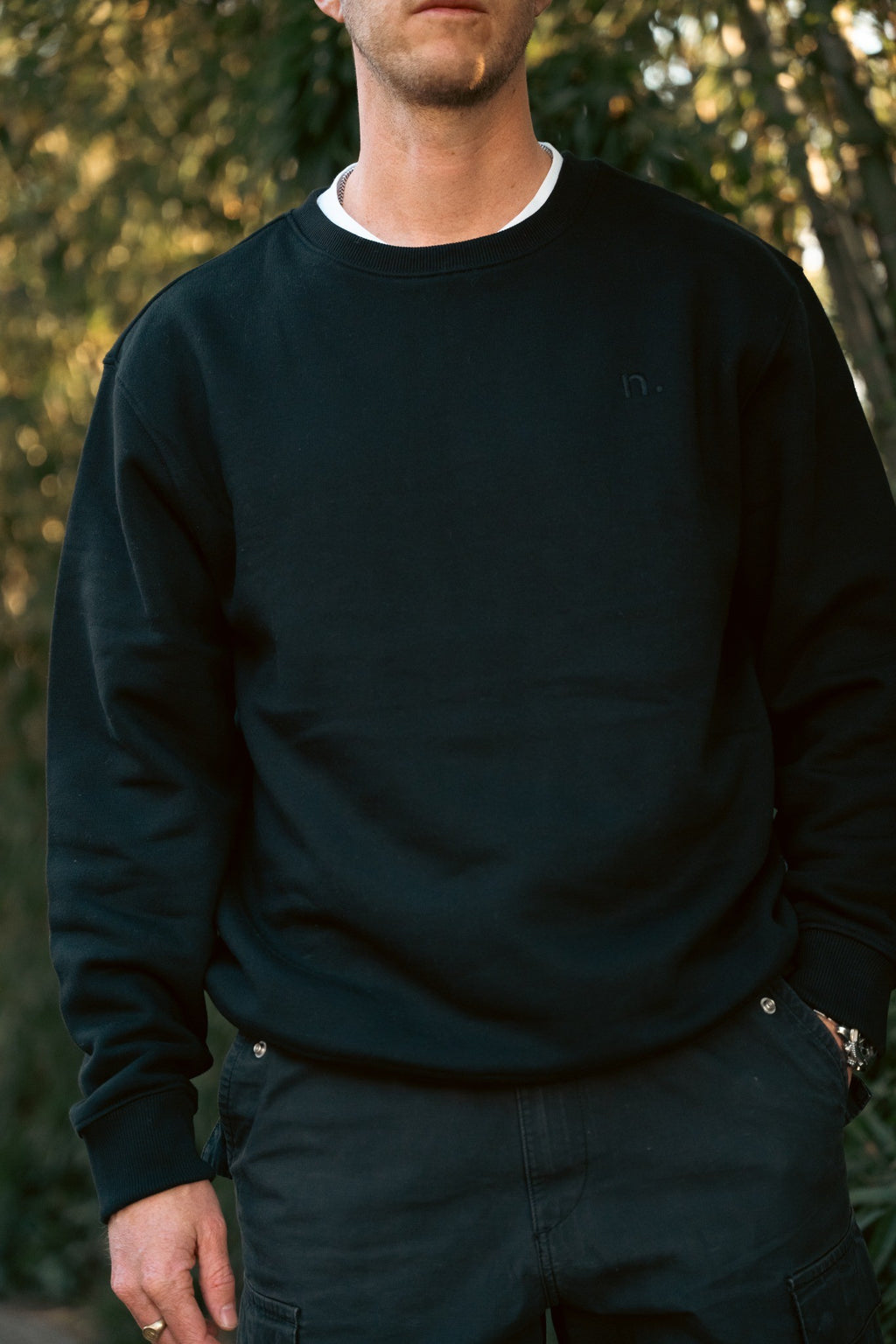the unisex blackout crew-neck sweater.