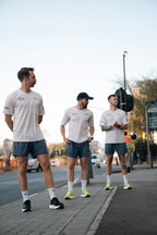 the OG beige male community tee.