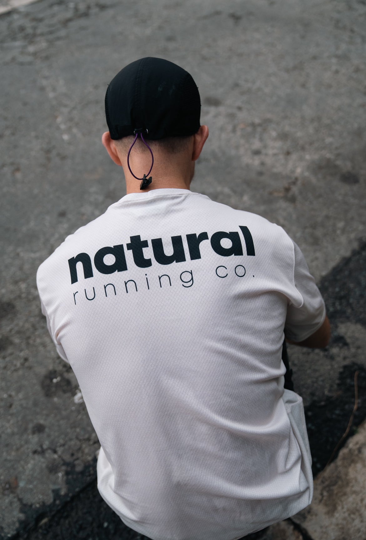 the OG beige male community tee.