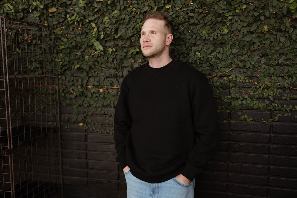 the unisex blackout crew-neck sweater.