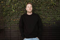 the unisex blackout crew-neck sweater.