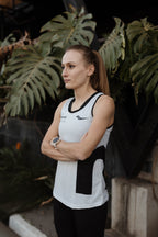 the beige female racer vest.