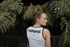 the beige female racer vest.