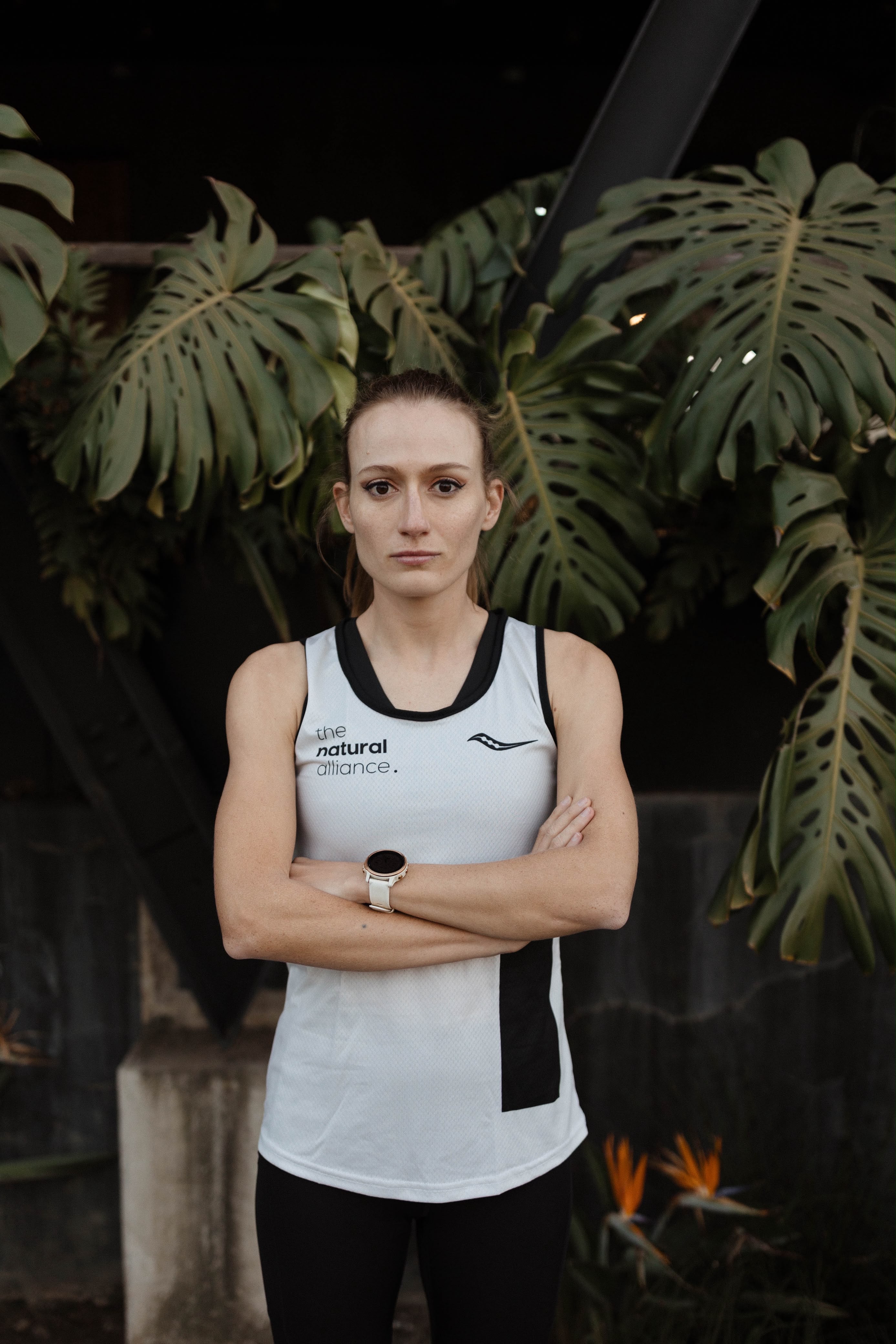 the beige female racer vest.